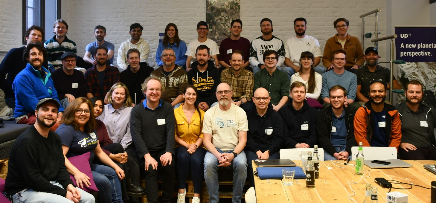 A group photo featuring 33 of the sprint attendees sitting in three rows.