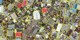 aerial imagery of a city with buildings labeled with yellow boxes for ai challenge